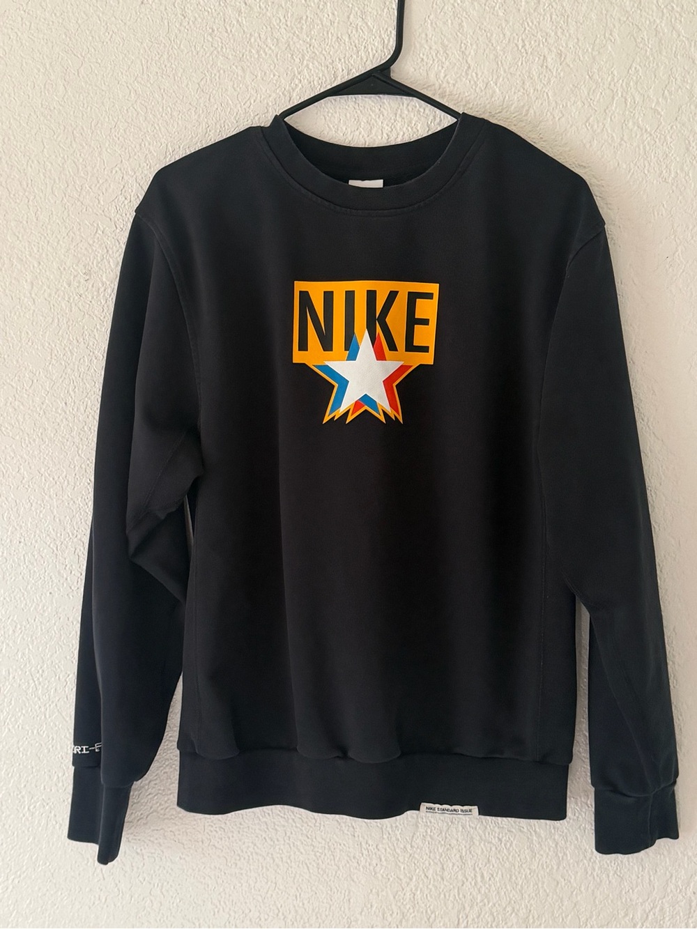 Nike Black Crewneck Sweatshirt with Multicolor Star Logo